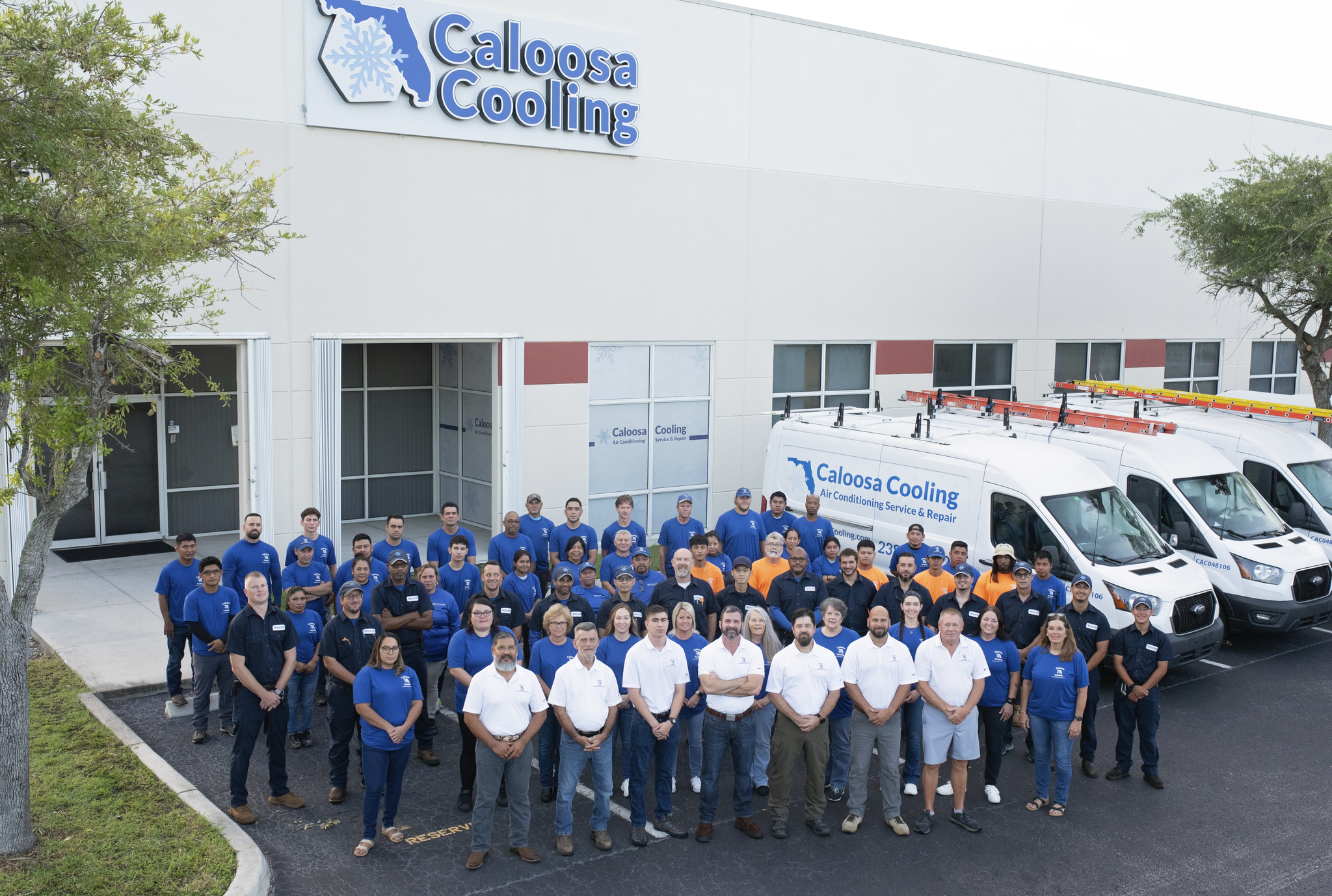 Caloosa Cooling Employees and Vans